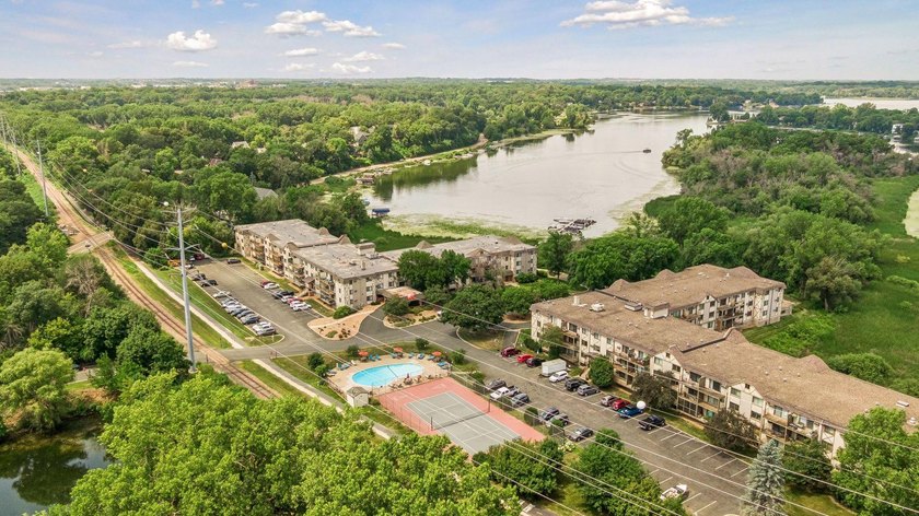 Come live at the Lake! Welcome to Sunrise Bay, a condominium - photo 2