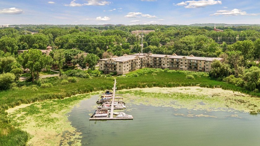 Come live at the Lake! Welcome to Sunrise Bay, a condominium - photo 3