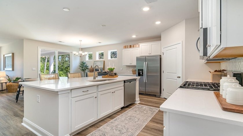 This thoughtfully designed 4 bedroom and 3 bath home is designed - photo 3
