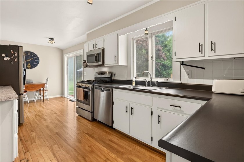 Welcome to 33 Greenbriar Dr in Gates. This Massive ranch is just - photo 21