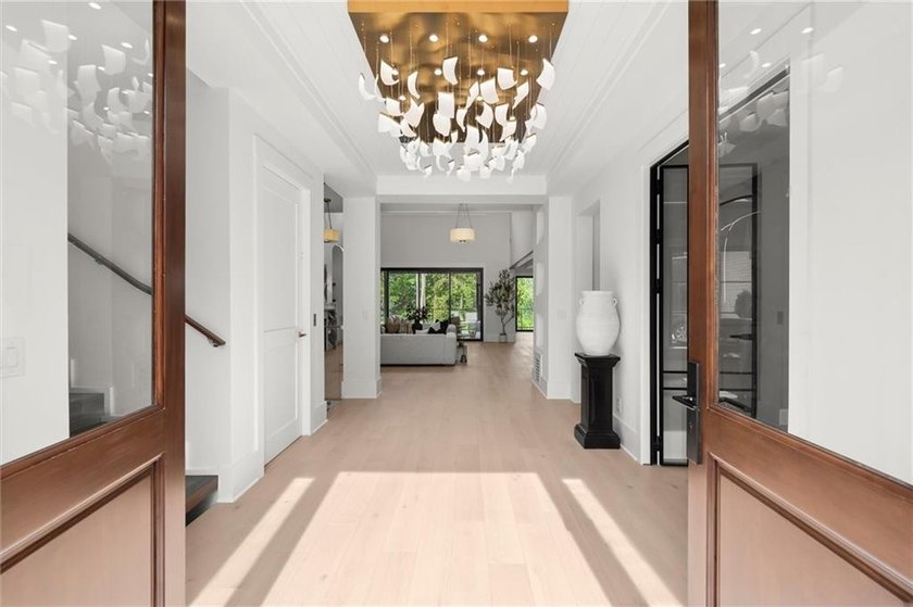 Welcome to 215 Traditions Drive, an exceptional custom luxury - photo 7