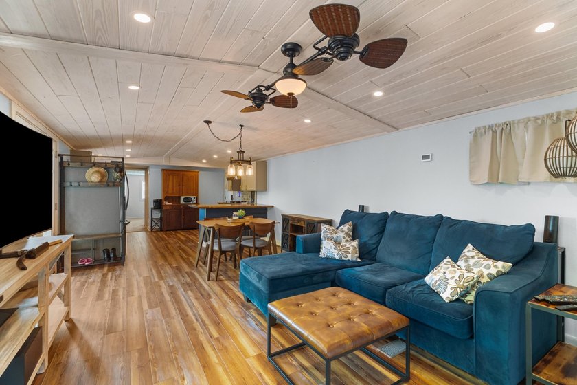 Welcome home to this charming, fully updated lake retreat on - photo 7