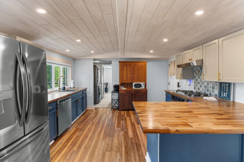 Welcome home to this charming, fully updated lake retreat on - photo 10