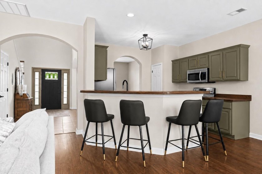 Welcome home to this totally renovated 5 bedroom, 2.5 bath home - photo 7
