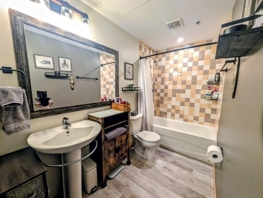 This beautifully maintained, open-concept condo/loft at River - photo 17