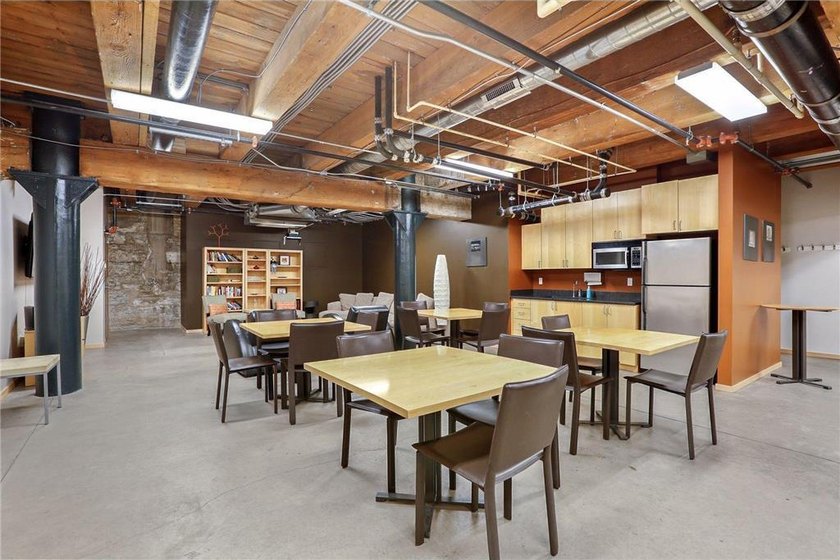 This beautifully maintained, open-concept condo/loft at River - photo 25