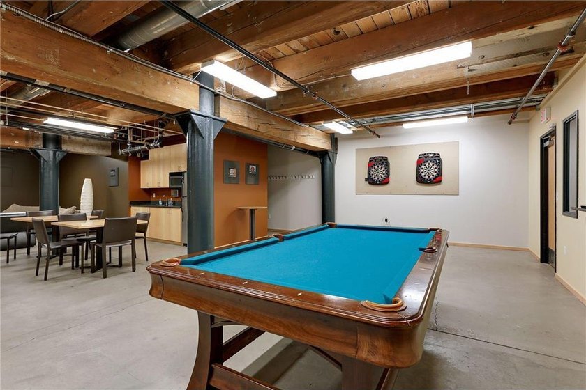 This beautifully maintained, open-concept condo/loft at River - photo 26
