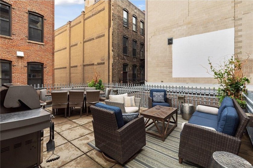 This beautifully maintained, open-concept condo/loft at River - photo 34