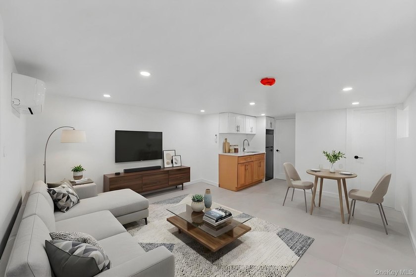 Experience modern living at its finest in this newly renovated - photo 9
