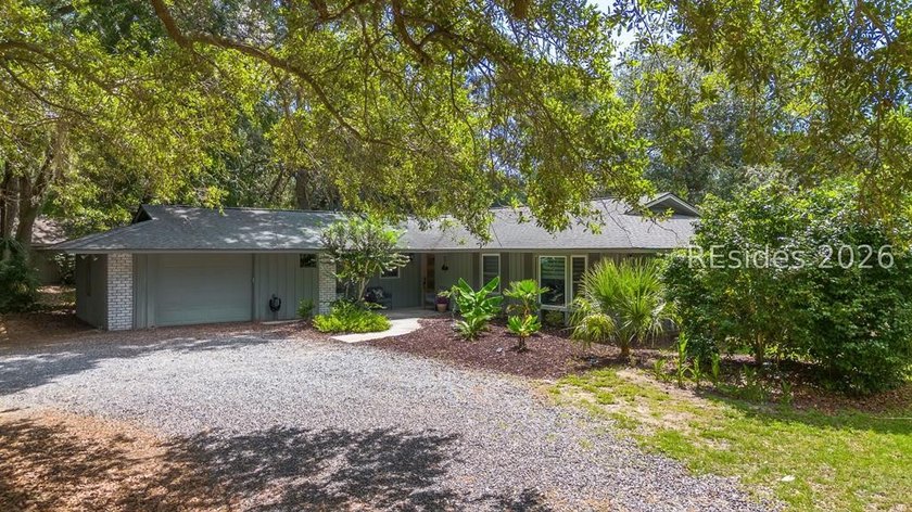 STEPS TO THE BEACH AND PRICED AT LOT VALUE!! Discover the - photo 2