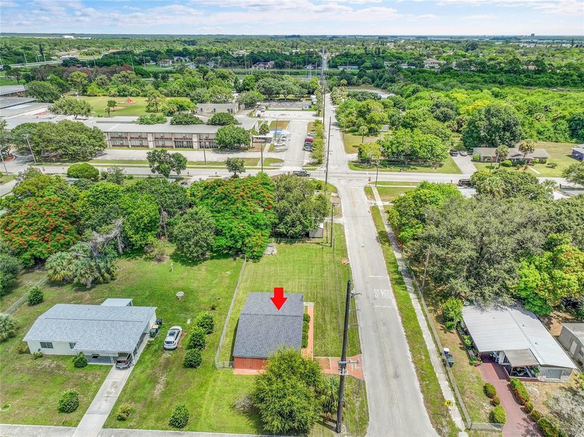 This rare coastal opportunity sits on an oversized lot with - photo 2