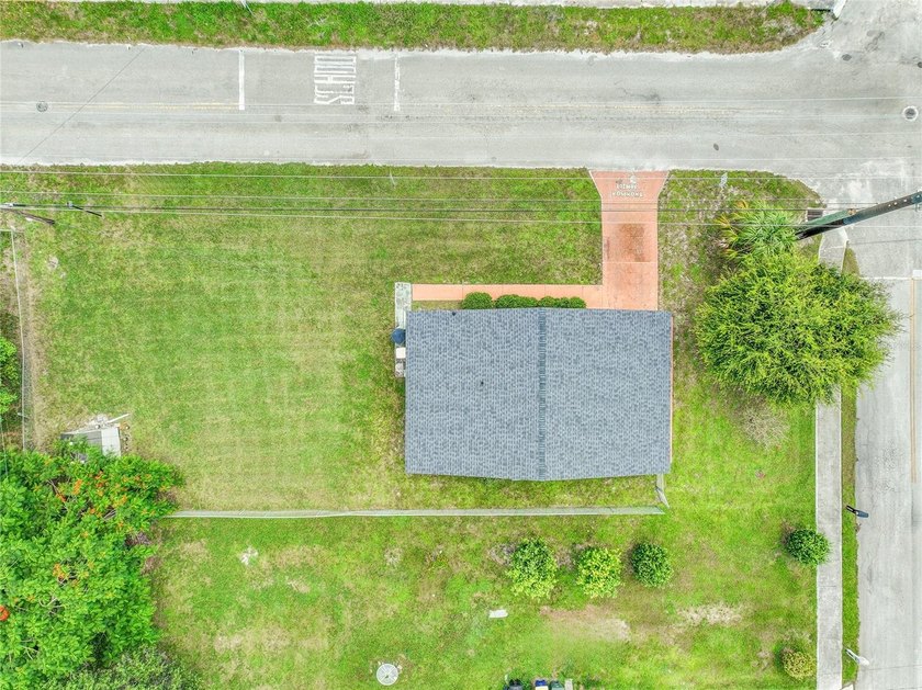 This rare coastal opportunity sits on an oversized lot with - photo 3