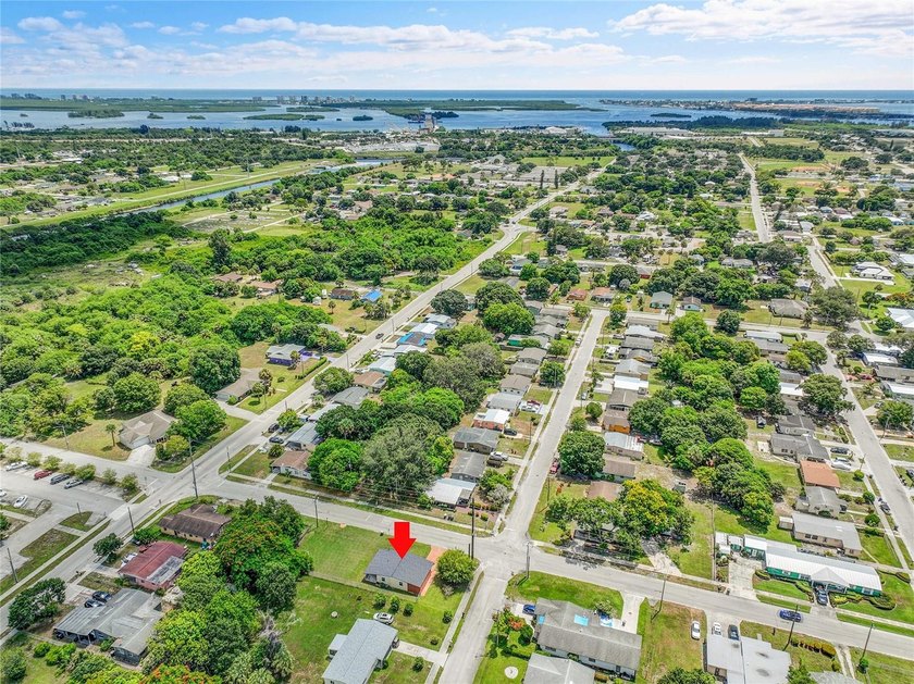 This rare coastal opportunity sits on an oversized lot with - photo 4