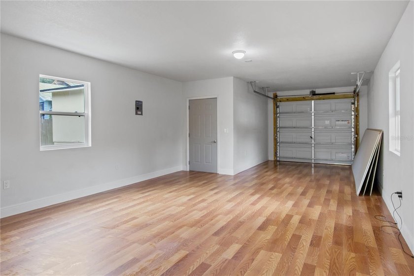 This meticulously renovated property features a new, detached - photo 2