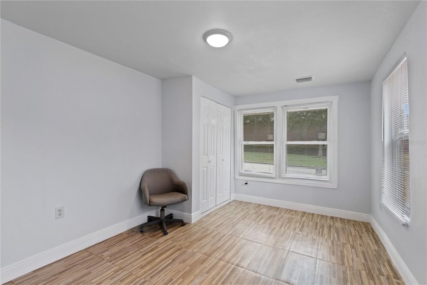 This meticulously renovated property features a new, detached - photo 6