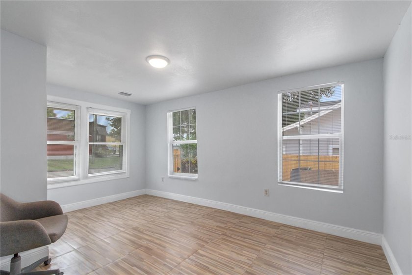 This meticulously renovated property features a new, detached - photo 7
