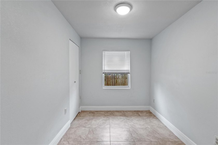 This meticulously renovated property features a new, detached - photo 10