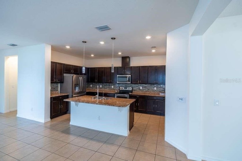 *Property is currently occupied/furnished; photos show vacant - photo 8