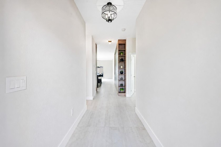 Beautifully upgraded 3-bed, 2-bath home in Oakland Park, built - photo 18