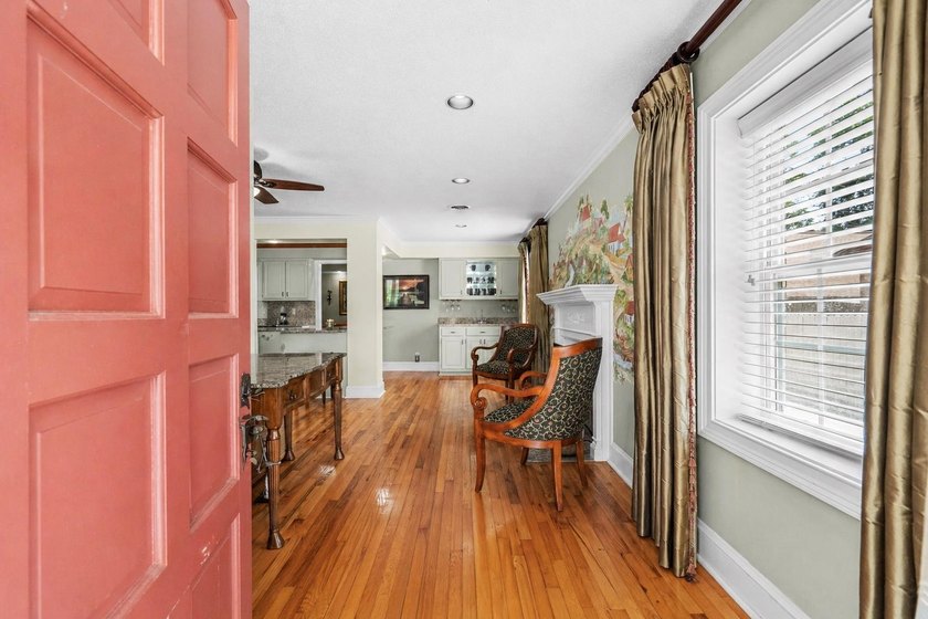 From the moment you arrive, this home tells a story. Over the - photo 3