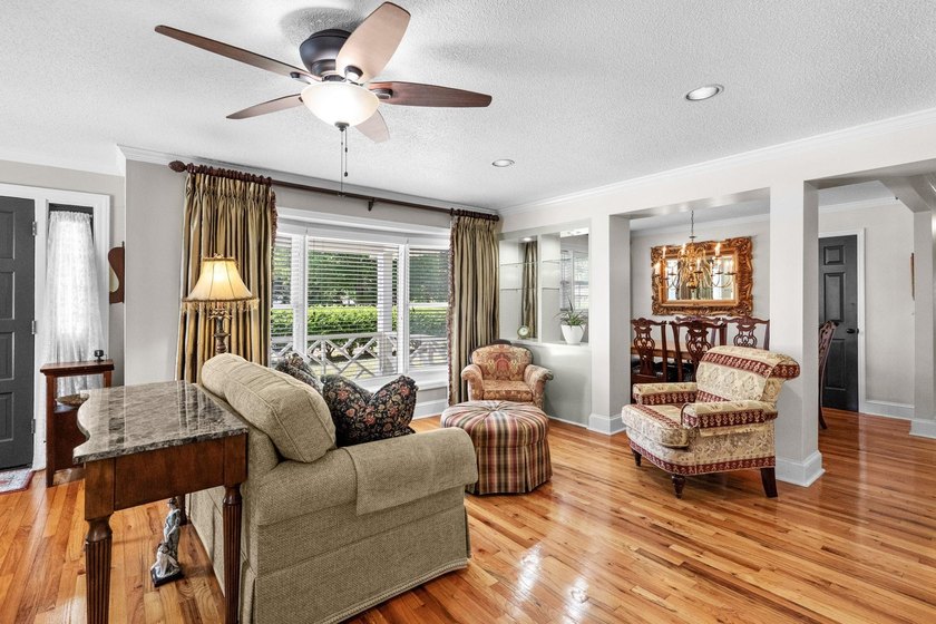 From the moment you arrive, this home tells a story. Over the - photo 4