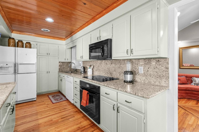 From the moment you arrive, this home tells a story. Over the - photo 10
