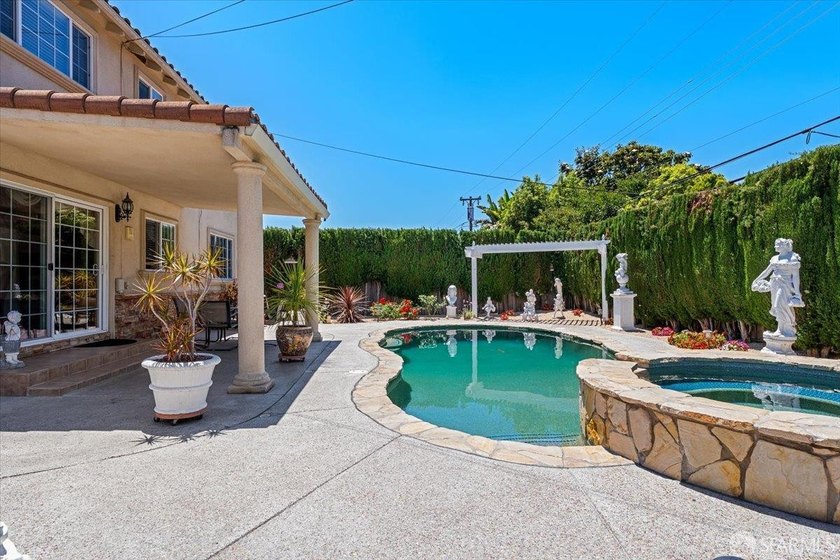 This spacious 4-bedroom, 3-bathroom Spanish Colonial Revival - photo 11