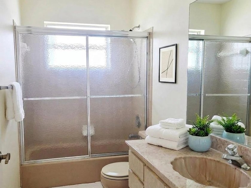Discover this charming lakefront home with a spacious open floor - photo 24