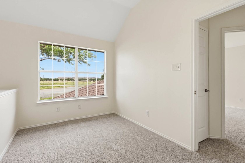Tucked at the quiet end of the street, this fully remodeled - photo 22