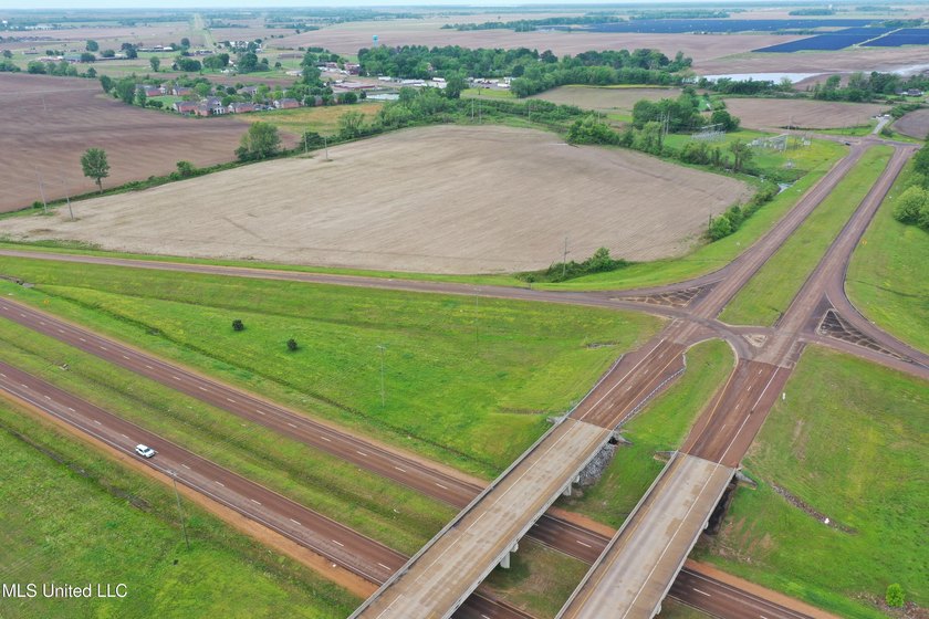 93+/- acres with long frontage on Hwy 302 (Goodman Rd) and also - photo 5