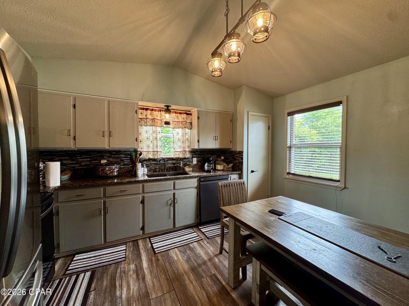 This charming 3BR/2BA completely renovated brick home on - photo 17