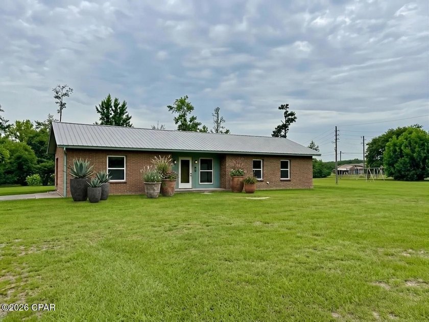 This charming 3BR/2BA completely renovated brick home on - photo 32