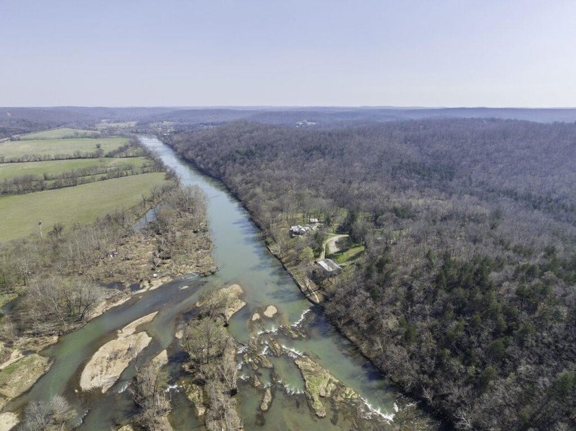262+/- acre &amp; country home for sale with long frontage on the - photo 2