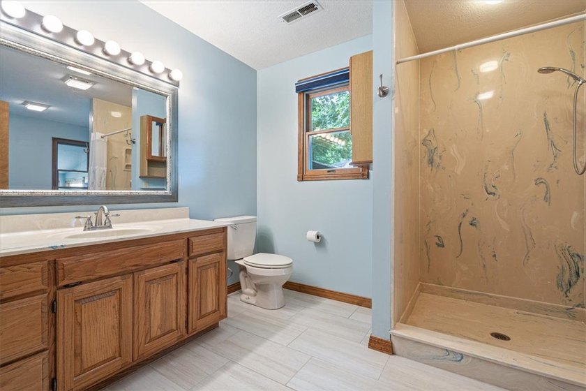 Lake area living at its very best in this lovely home with - photo 18