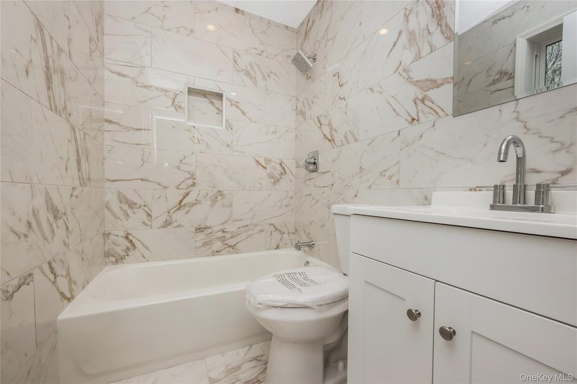 Welcome to this beautifully renovated 4-bedroom, 2.5-bath home - photo 13