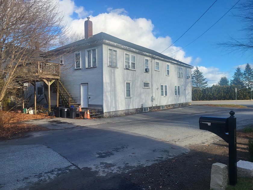 This two-story building is currently an active church on the - photo 3