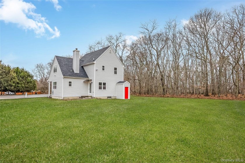 Welcome to this beautifully renovated 4-bedroom, 2.5-bath home - photo 26