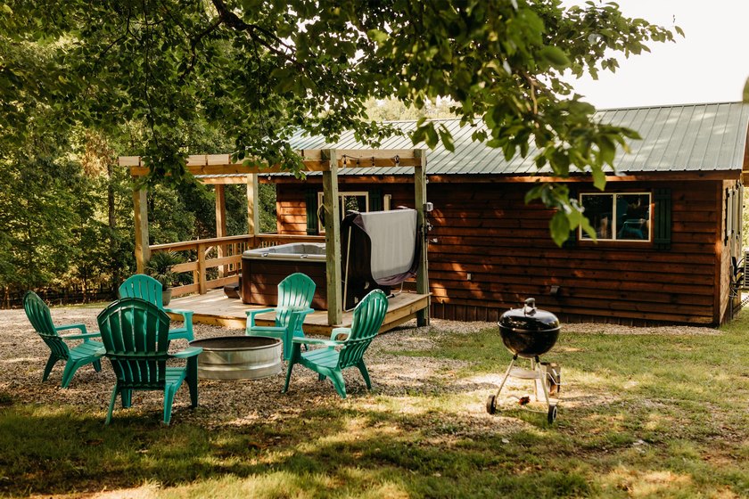 Tucked away on 2 private acres among the trees, *Simmer Down* is - photo 2