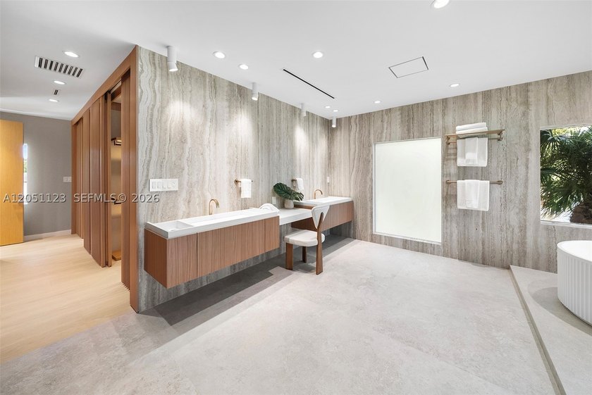Spectacularly remodeled, unique corner estate situated on nearly - photo 50