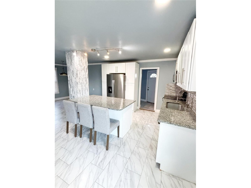 Experience modern luxury in this stunning, fully renovated - photo 6