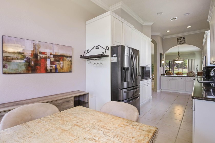Welcome to this stunning single-story residence in Oakmont at - photo 12
