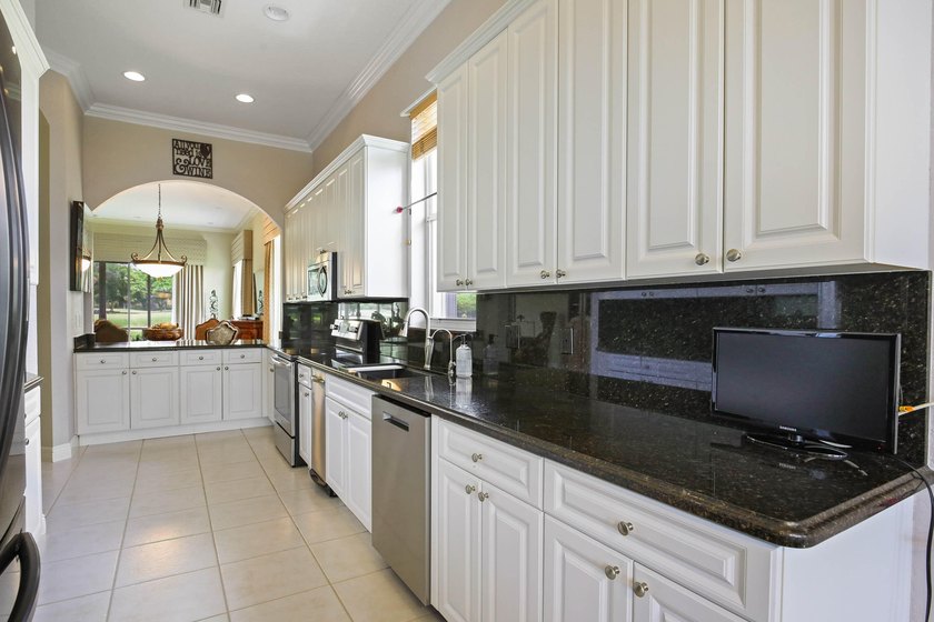 Welcome to this stunning single-story residence in Oakmont at - photo 13