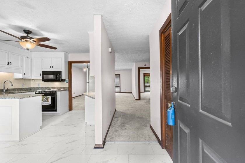 Unit 301 at Spinnaker's Reach is a spacious top-floor condo - photo 3