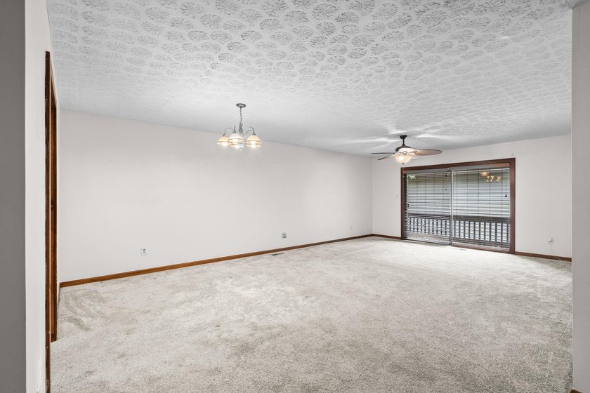 Unit 301 at Spinnaker's Reach is a spacious top-floor condo - photo 4