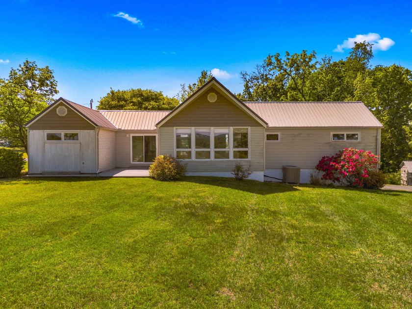 Welcome home to 1456 C H Rankin Road in White Pine -- a rare - photo 2