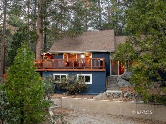 Perched on a gently sloping hillside among granite boulders and - photo 3