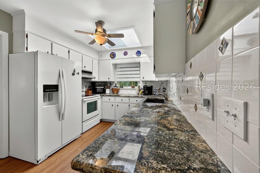 STEPS TO THE BEACH AND PRICED AT LOT VALUE!! Discover the - photo 21
