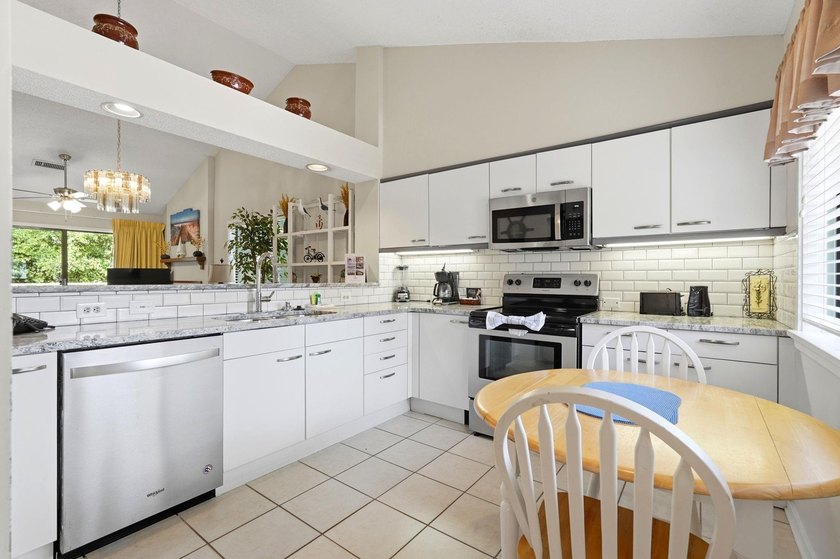 Welcome to 110 Hartland Dr, Unit 15-E, a beautifully designed - photo 9