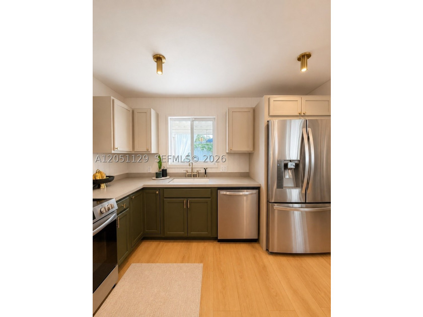 Completely remodeled with a designer's eye, this beautiful home - photo 19