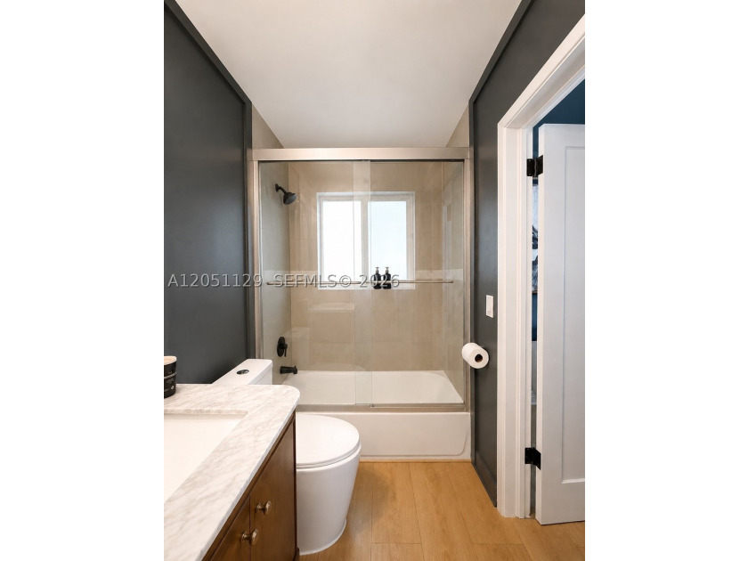 Completely remodeled with a designer's eye, this beautiful home - photo 32